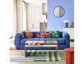 Nowoczesna elegancka sofa z pikowaniami Pin kremowa