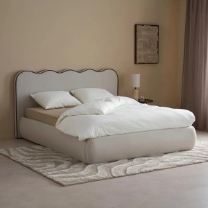 Łóżko tapicerowane Solea z falowanym zagłówkiem