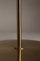 Mosiężna lampa podłogowa Eclipse Dutchbone