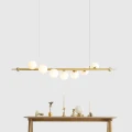 Lampa wisząca nad stół WAVE mosiężna